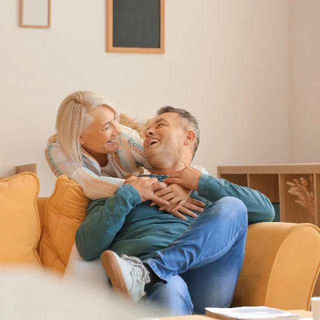 Older couple relaxing together at home